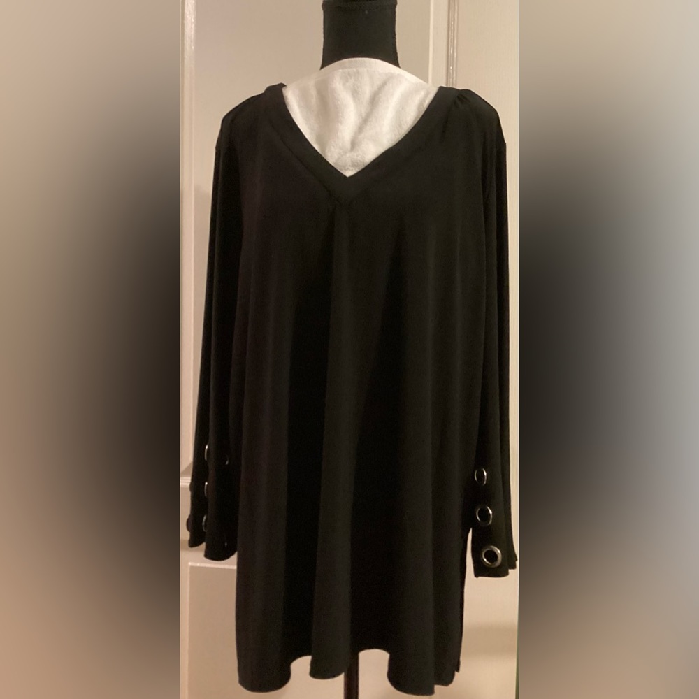 Slim Factor black knit, v neck tunic with grommets on long sleeves.